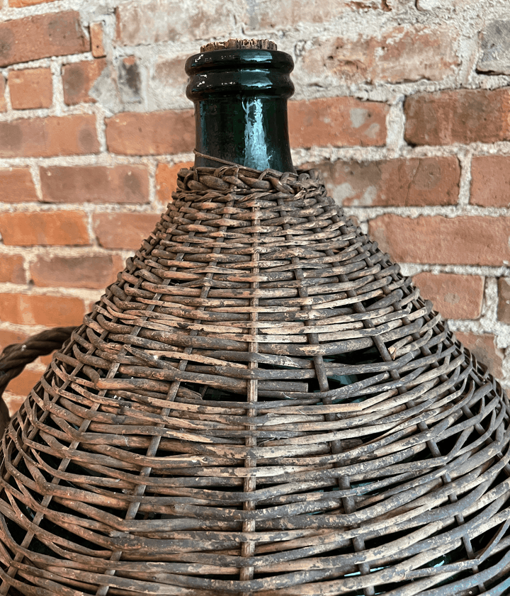 Antique French Demijohn in Wicker Basket