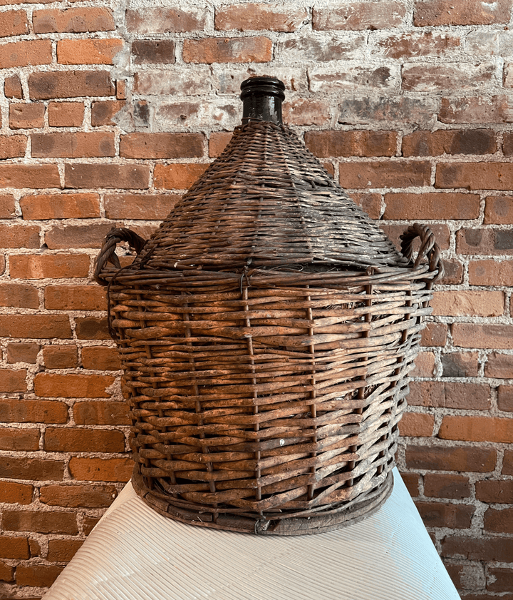 Antique French Demijohn in Wicker Basket