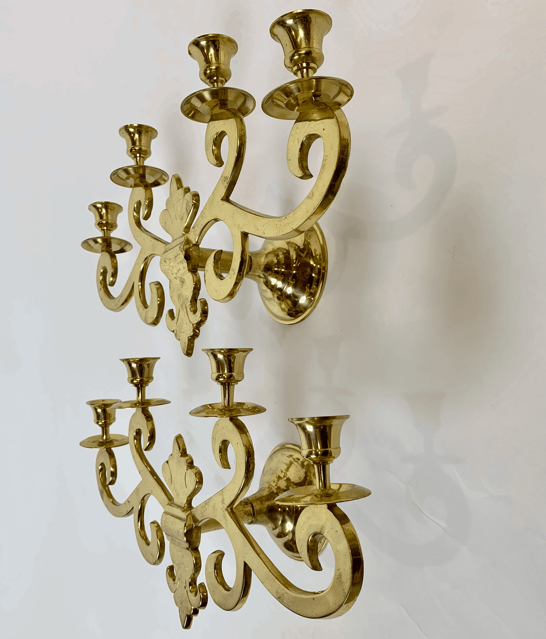 Pair of Mid-Century Four-Arm Brass Candle Sconces - andfoundfurnishings