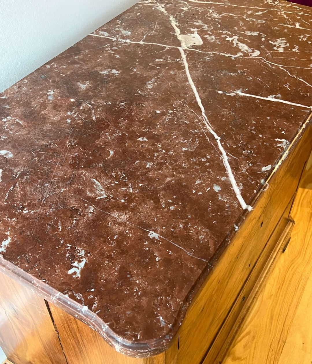19th-century French Louis-Philippe Marble-top Commode featuring a Rouge-Royal marble top with rose and cream veining.