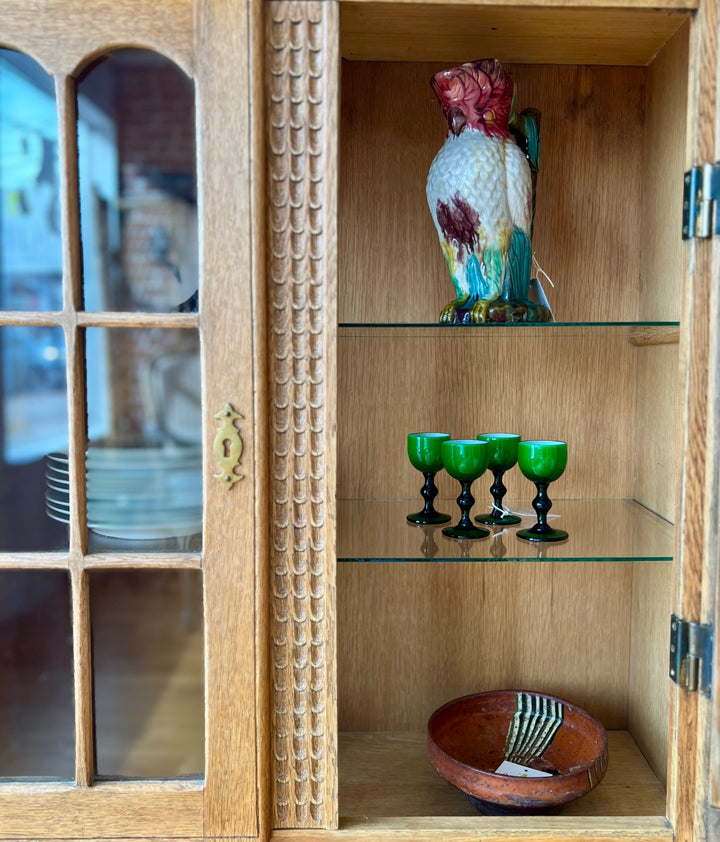 Antique Danish Oak Cabinet with Hidden Drawer and 1816 Lock circa 1930s highlighting unique display items.