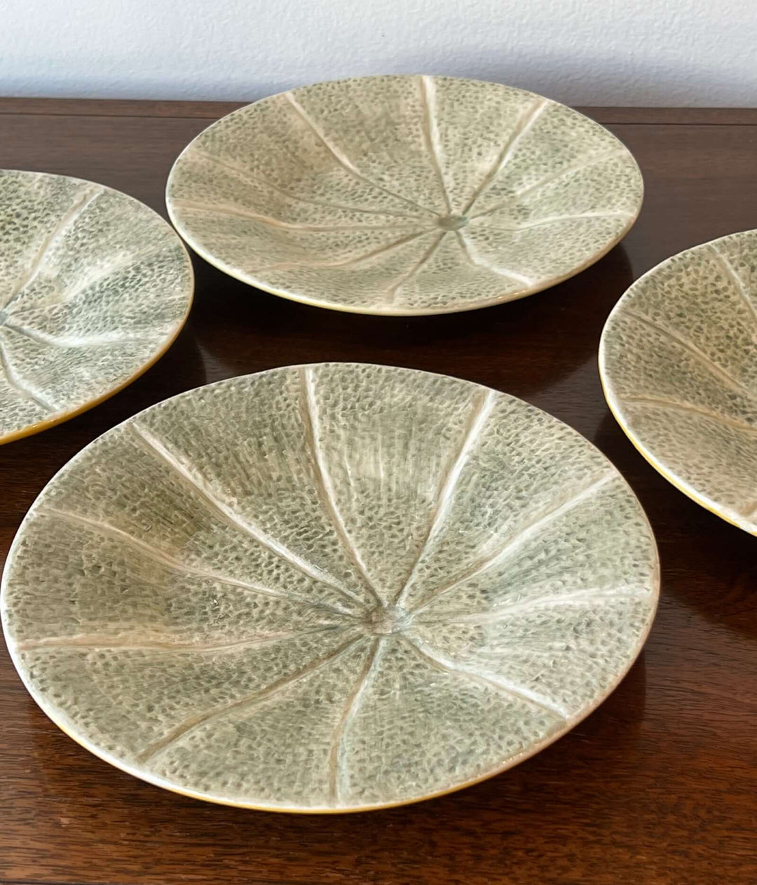Set of Bordallo Pinheiro Melon Dessert Plates from Portugal, featuring naturalistic veining and celadon-green glaze.