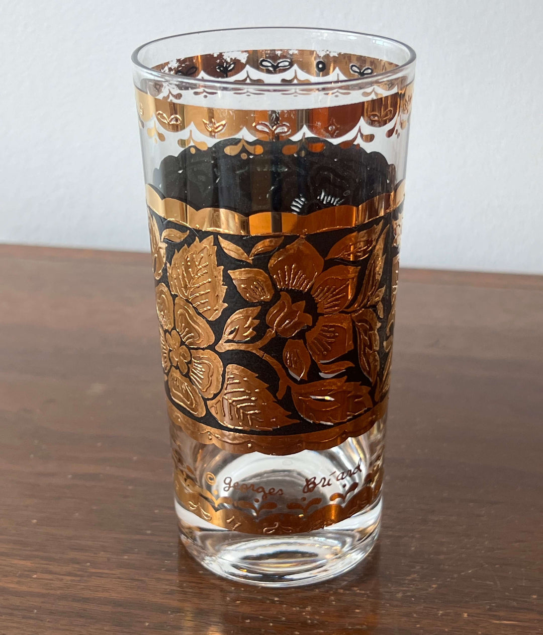 Set of Georges Briard Gold & Black Floral Highball Glasses featuring ornate gold floral design on black enamel