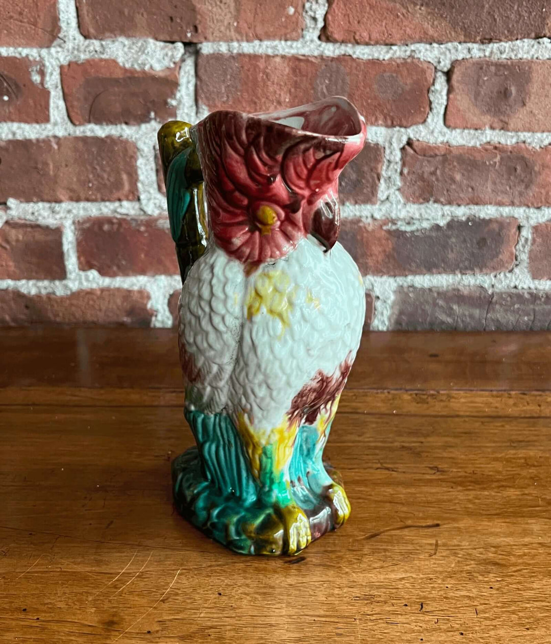 Vintage Majolica Cockatoo Pitcher with colorful glaze and feather detailing, mid-20th century design.