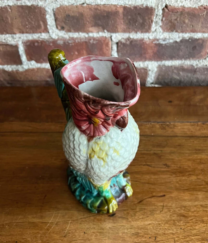 Vintage Majolica Cockatoo Pitcher with colorful glaze and feather detailing, 5.5"W x 4"W x 8.75"H.