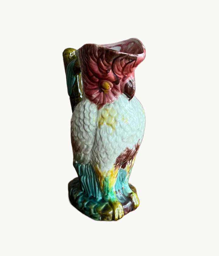 Vintage Majolica Cockatoo Pitcher featuring colorful glaze and detailed feather design.