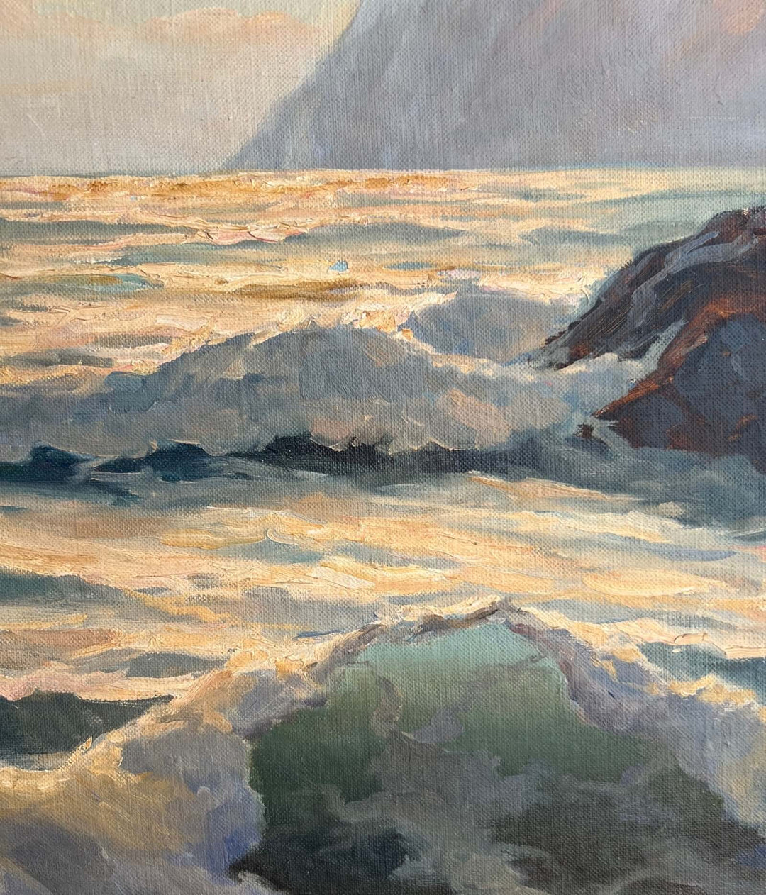 Artistic depiction of a snowy landscape with mountains and rocks.