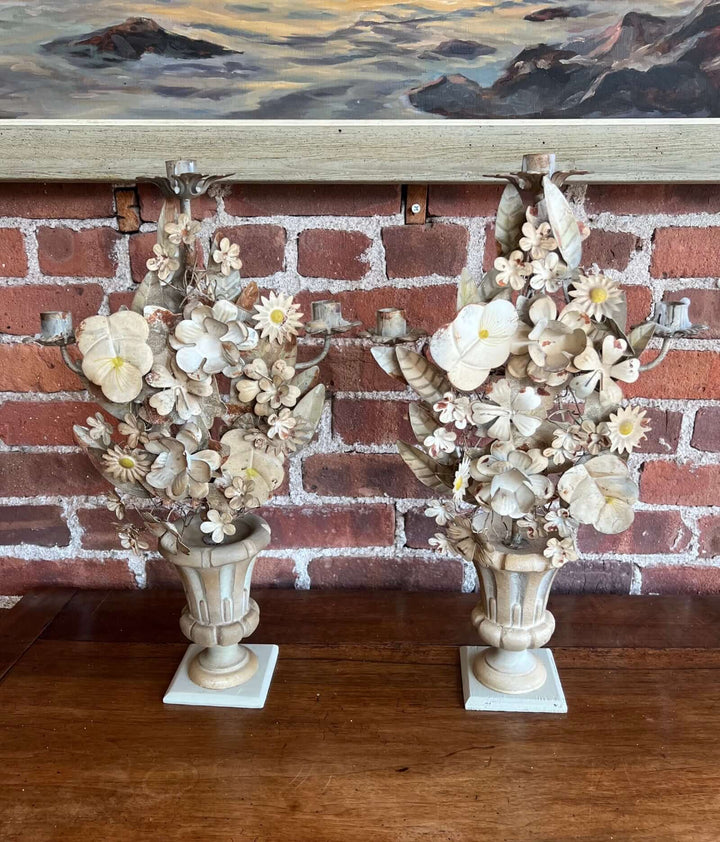 Pair of Vintage Italian Tole Floral Candelabras with hand-painted flowers and urn-shaped bases.
