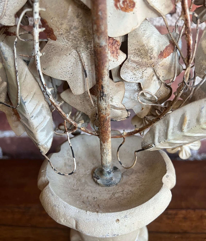 Pair of Vintage Italian Tole Floral Candelabras showcasing distressed details and hand-painted metal flowers.