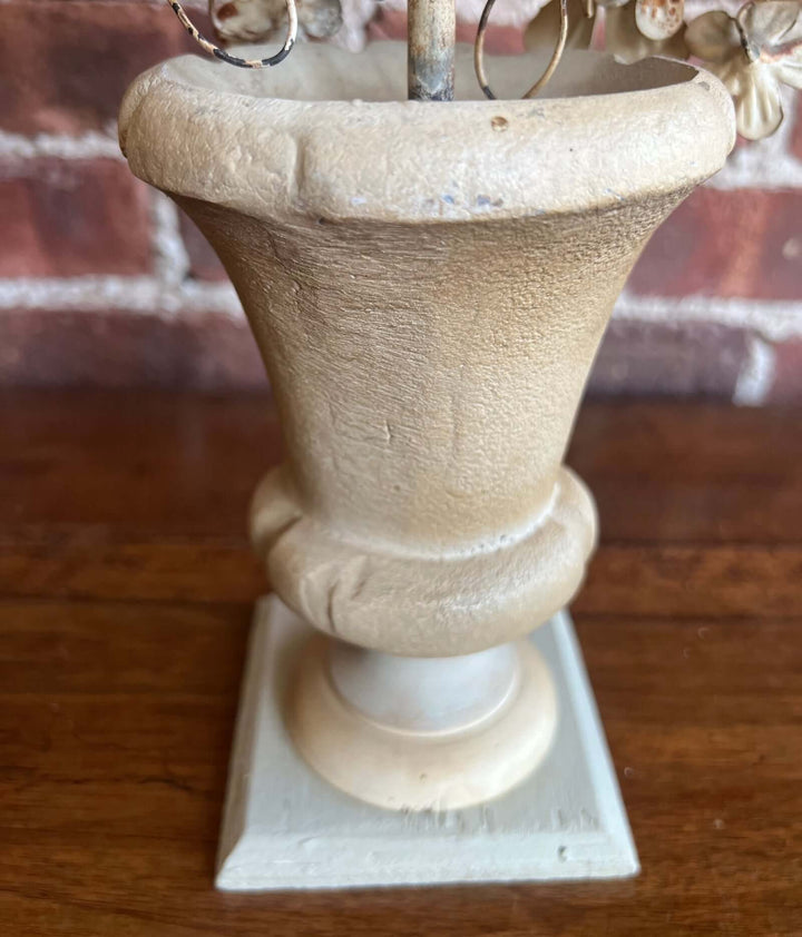 Pair of Vintage Italian Tole Floral Candelabras base detail showing neutral tones and vintage charm.