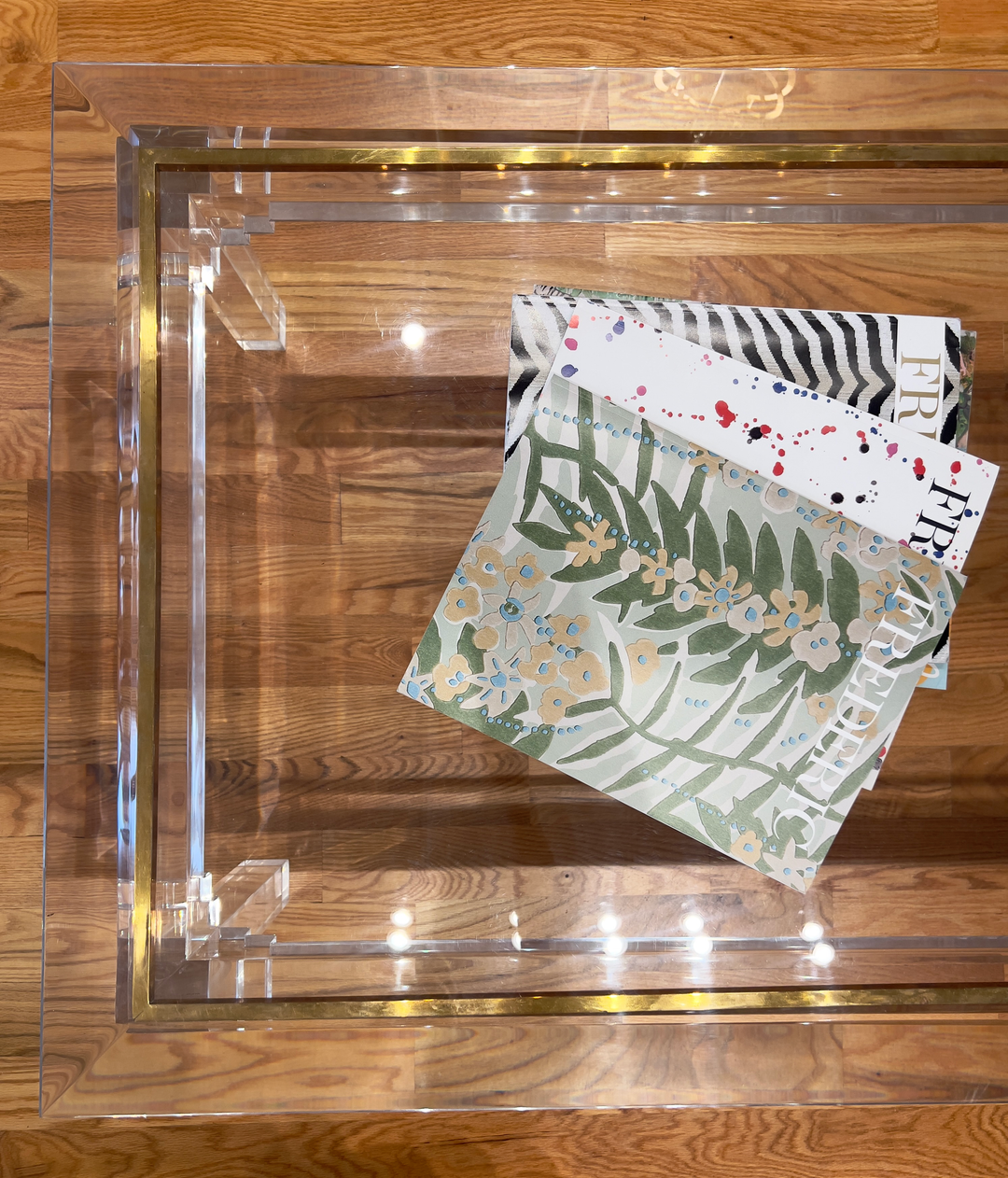 Vintage Lucite and Brass Coffee Table - andfoundfurnishings